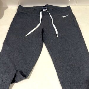 Nike Dark Grey cropped joggers. Size SM.